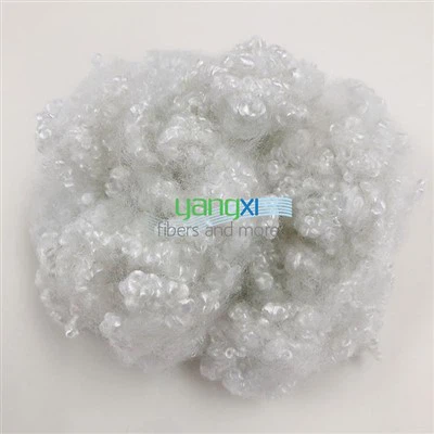 Fibra de poliéster conjugada