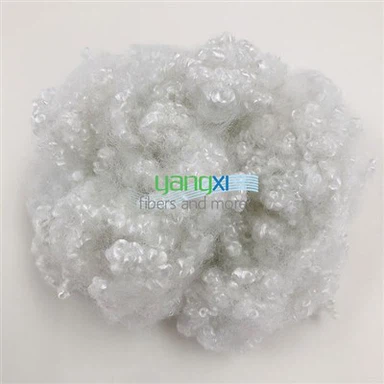 Fibra de poliéster conjugada